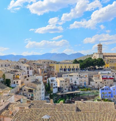 Discover the charming old town of Cehegín, Spain, captured under a bright blue sky.