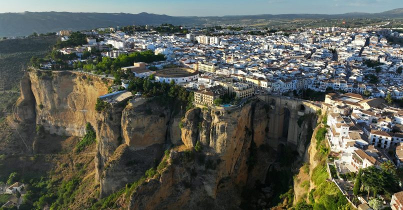 Explore the breathtaking aerial view of Ronda, Spain, with its dramatic cliffs and historic architecture.